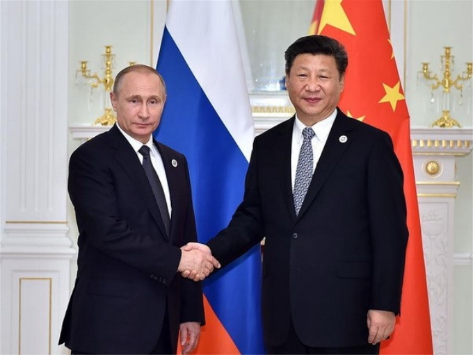 Chủ tịch Trung Quốc Tập Cận Bình và Tổng thống Nga Vladimir Putin. (Nguồn: Xinhua)